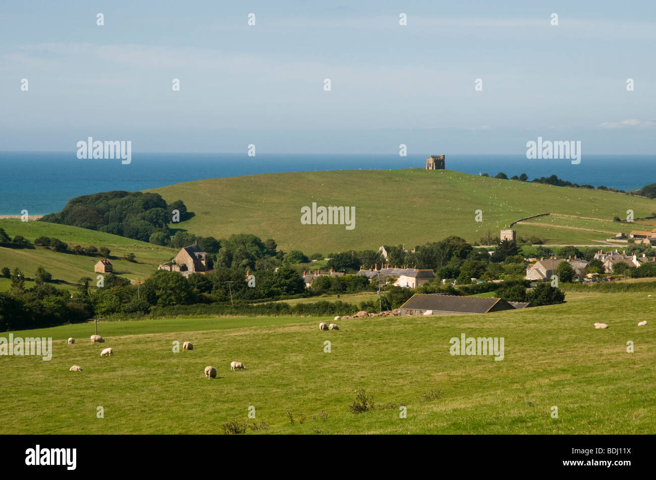 Beautiful countryside & coast of Dorset, England.  Village of  Abbotsbury  below where there is a Swannery. Stock Photo