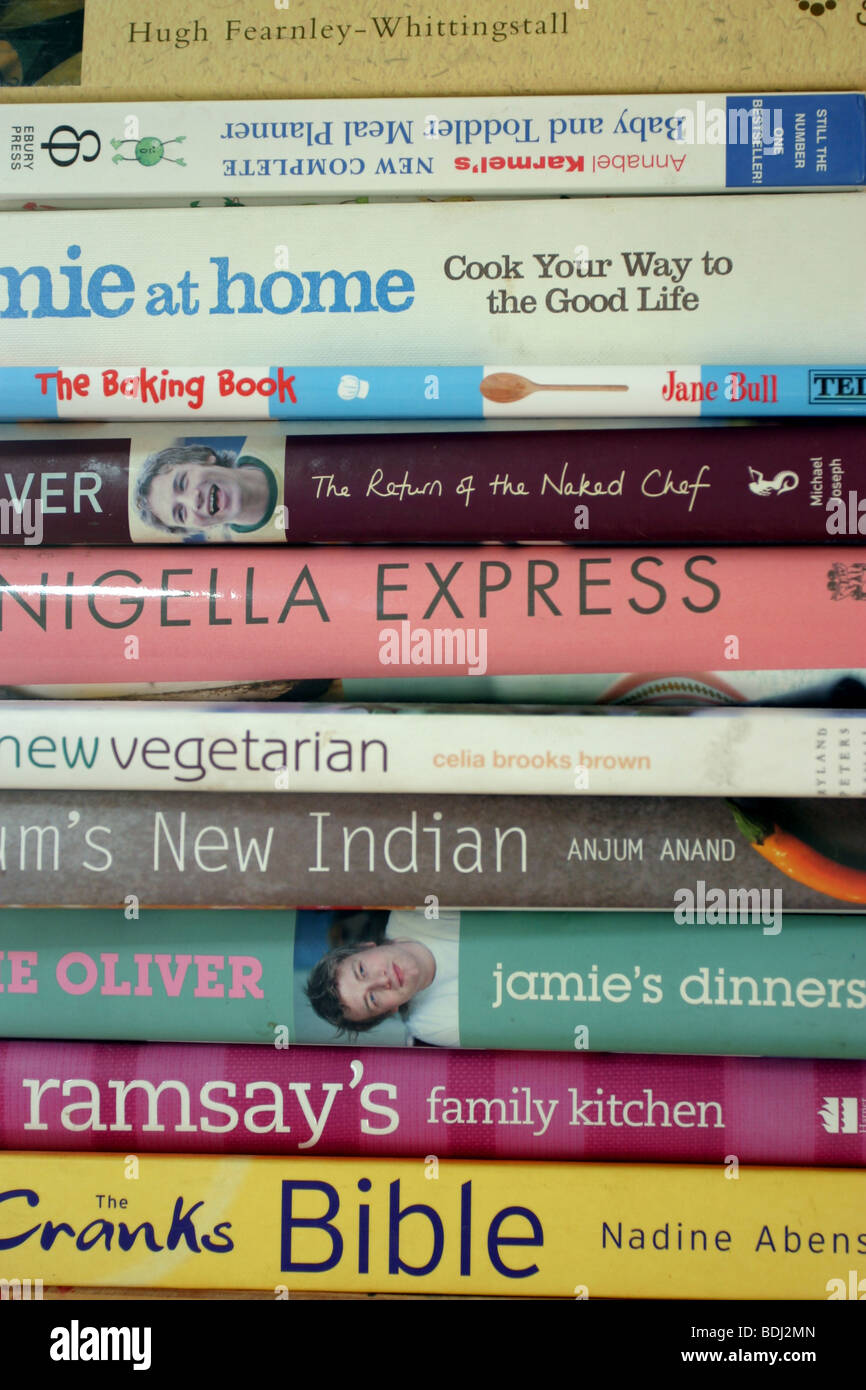 Cookbooks on a kitchen shelf Stock Photo