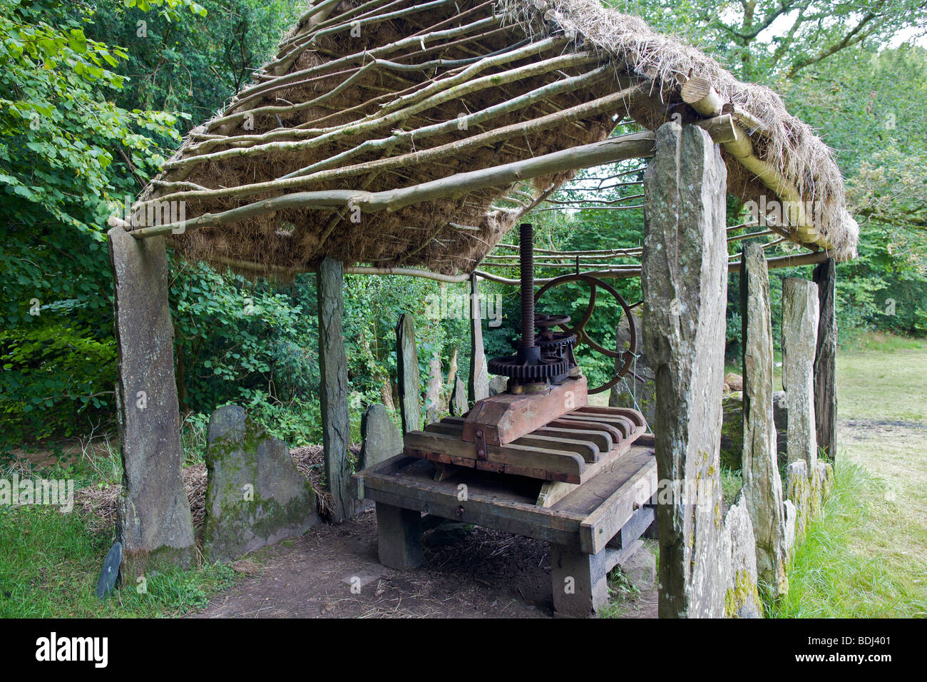 Maison Cornec or Cornec House, one of the first eco-museums in France. A standing stone grange housing a cider press. Stock Photo