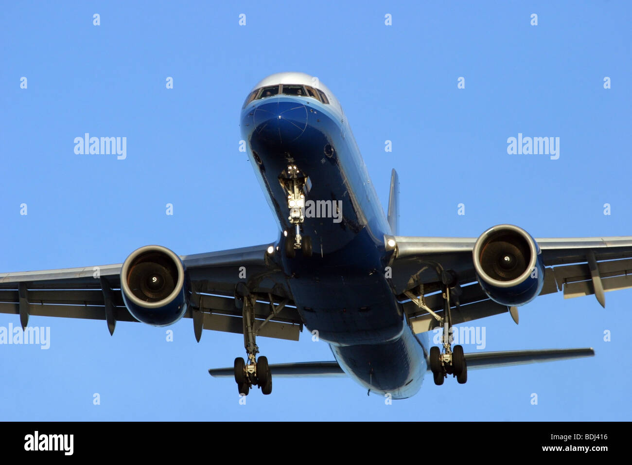 United Airlines airliner on final approach for Logan International airport in Boston Massachusetts. Stock Photo