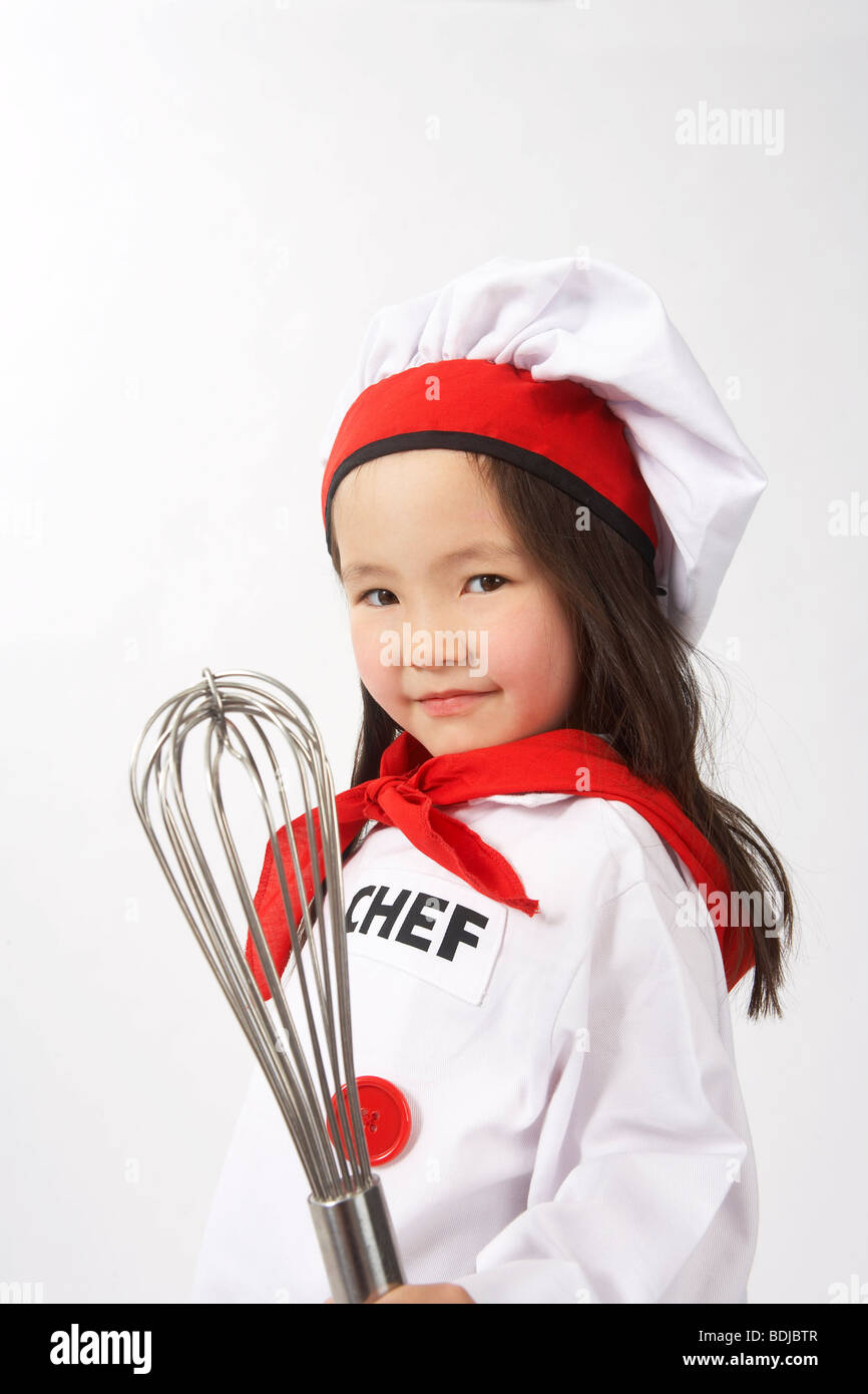 Girl pretending cook hi-res stock photography and images - Alamy