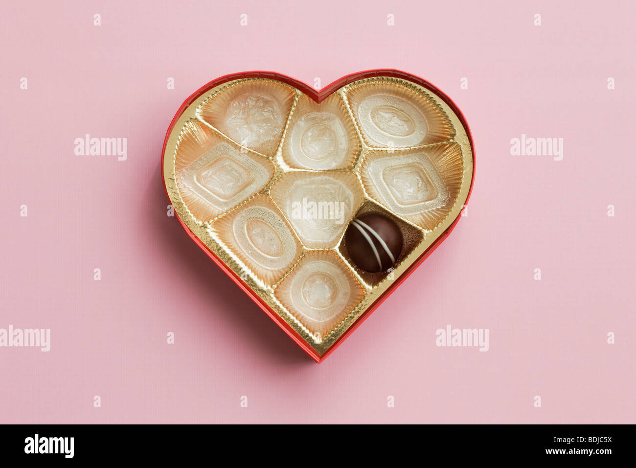 Still Life of Heart-Shaped Box of Chocolates Stock Photo