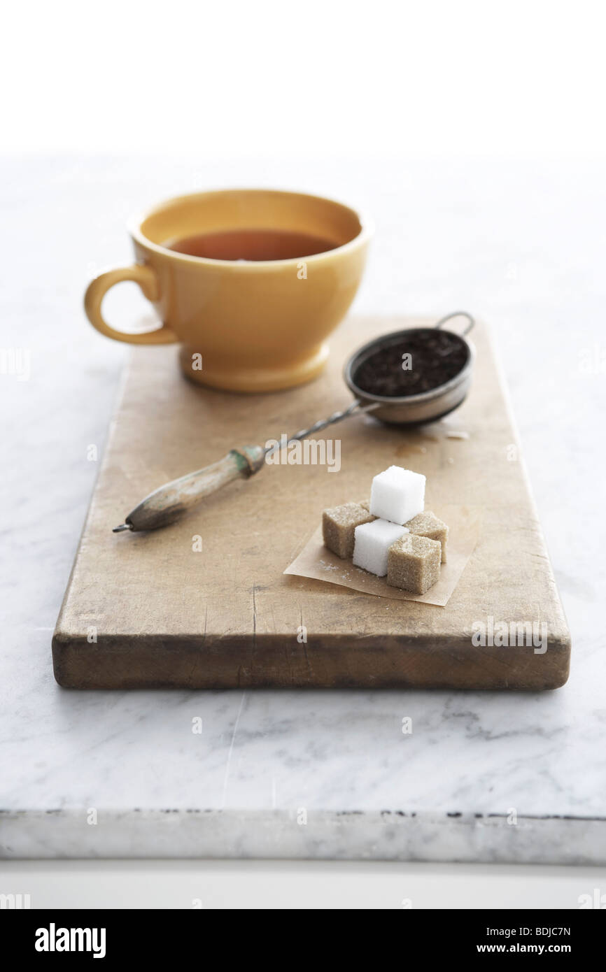 Tea Cup and Tea Strainer Stock Photo Alamy