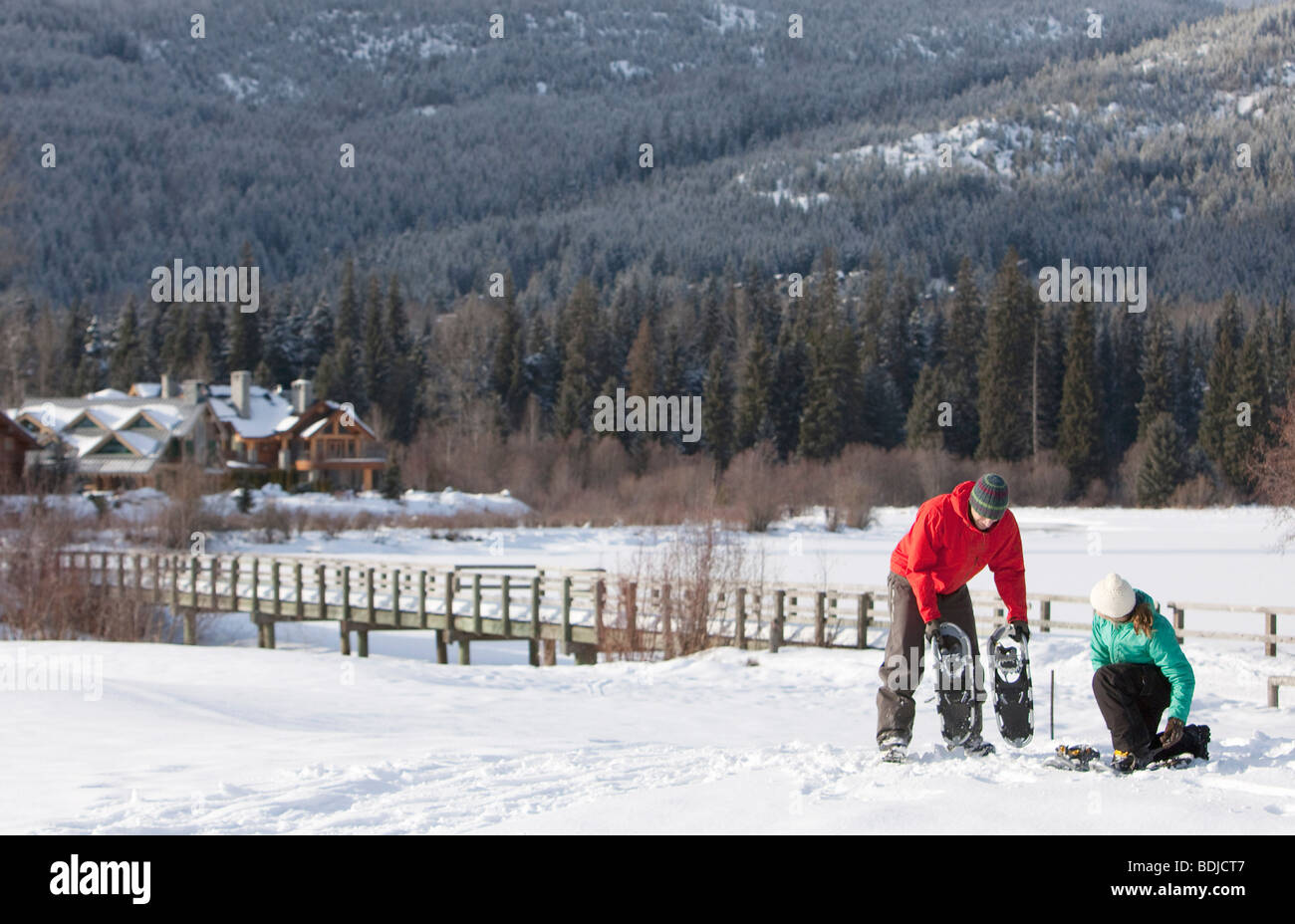 Couple Snowshoeing in Whistler, British Columbia, Canada Stock Photo