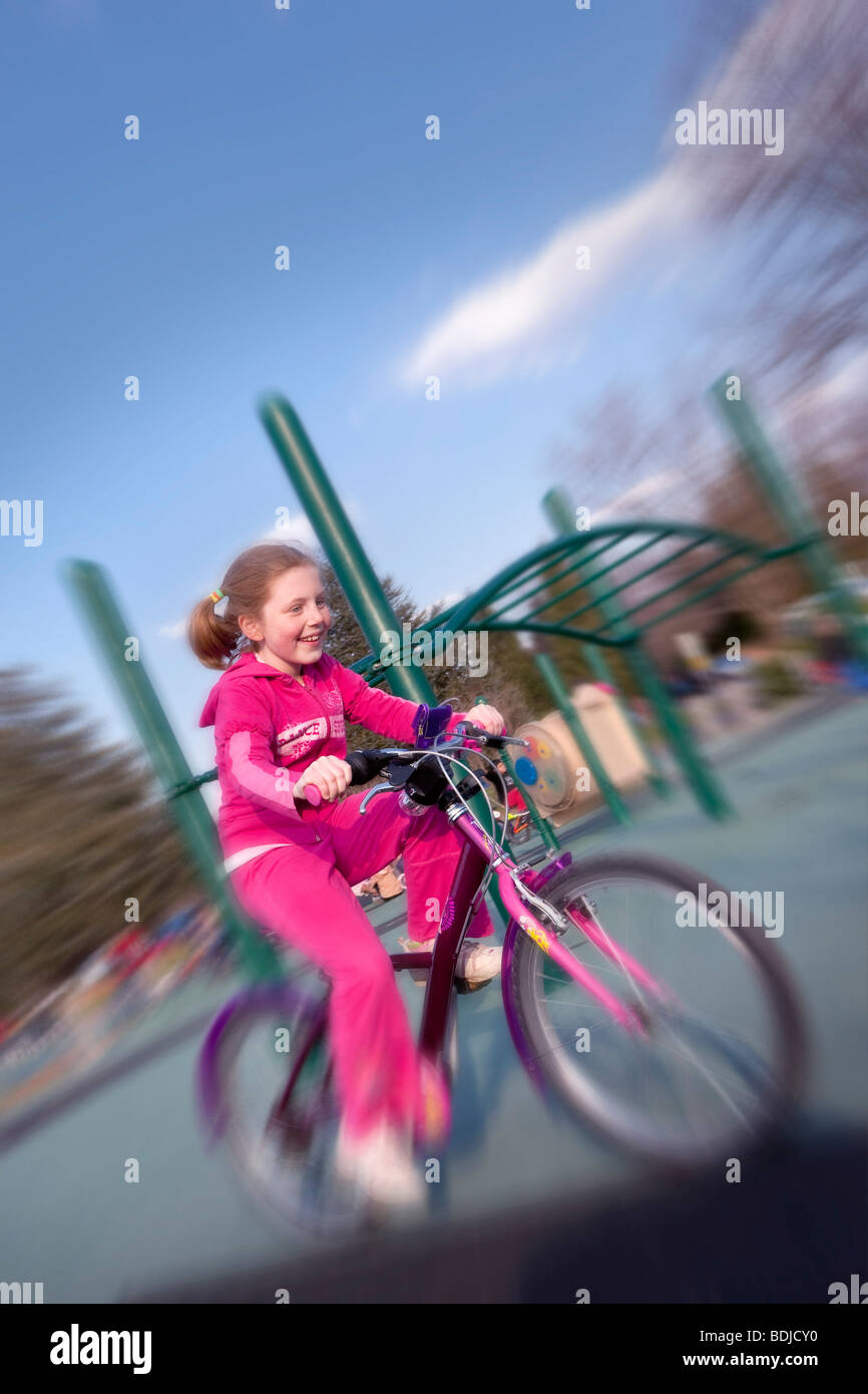 Girl Riding Bike Stock Photo Alamy