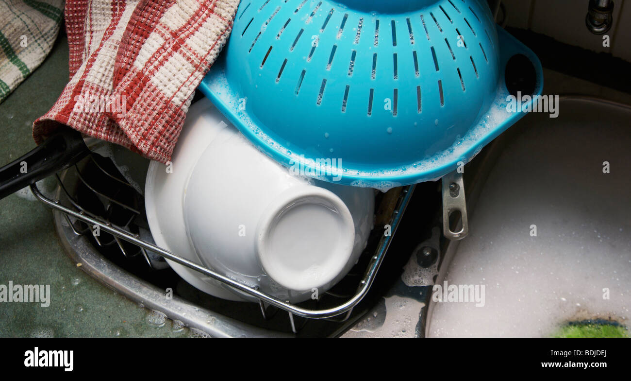Dishes Drying in Rack Stock Photo Alamy