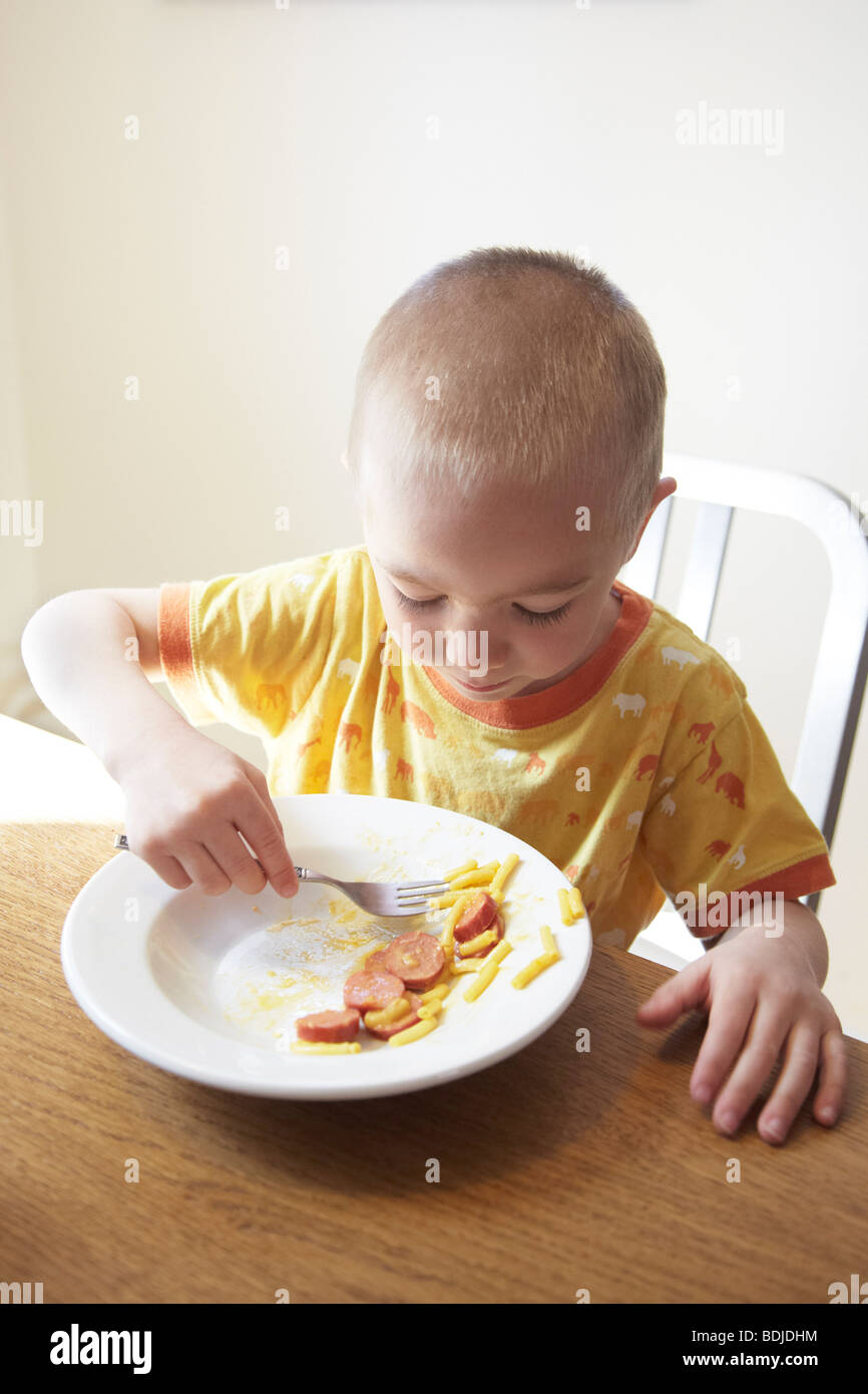 Four year old boy eating hi-res stock photography and images - Alamy