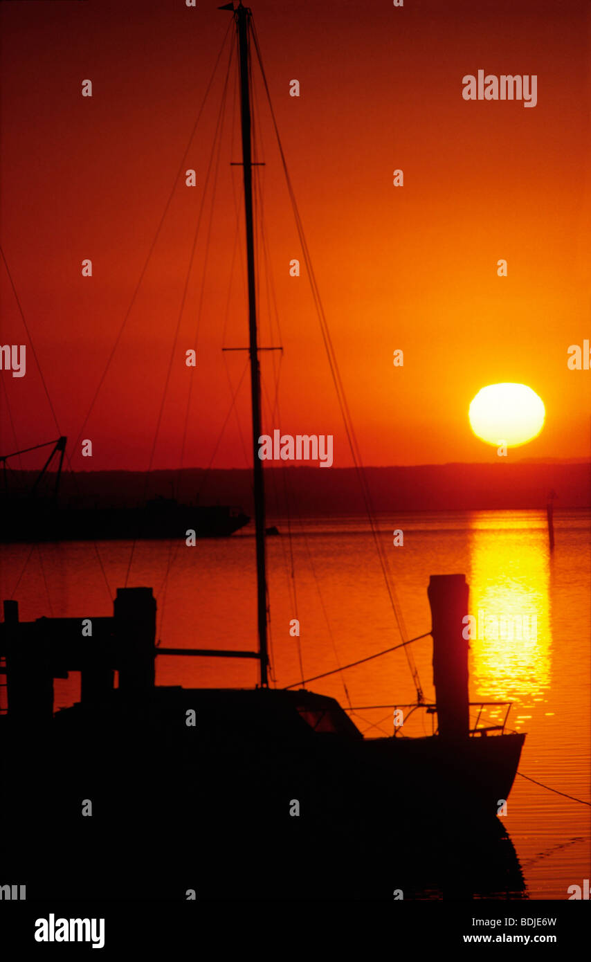 Yacht at Anchor, Silhouette, Seascape Sunset Stock Photo