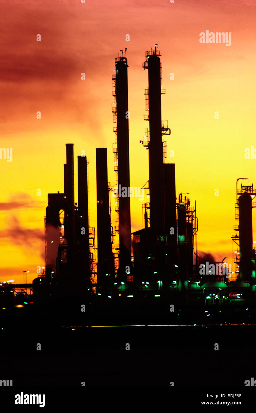 Oil Reginery, Sunset Silhouette Stock Photo