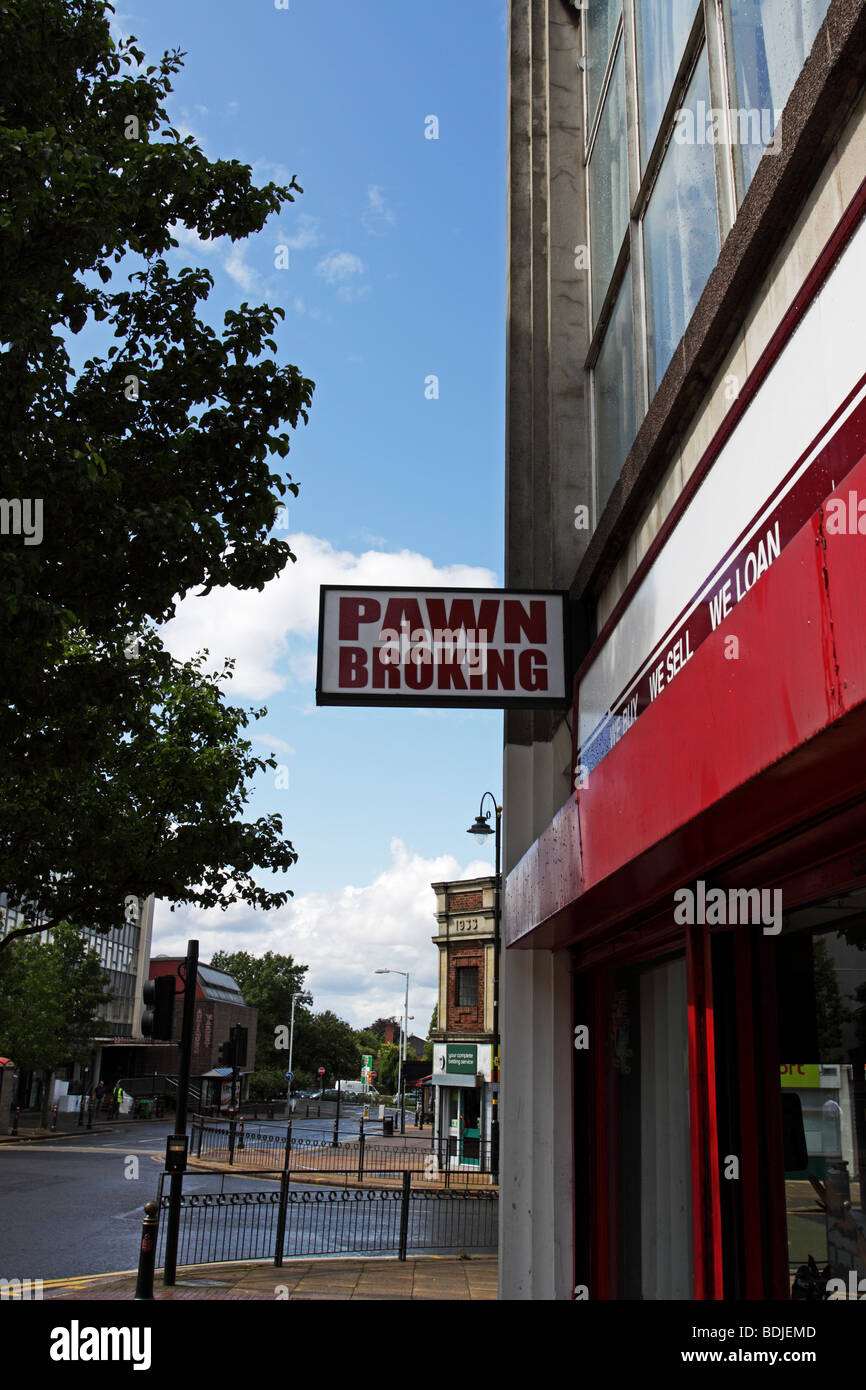 Pawn broking sign outside a high street money lenders Stock Photo