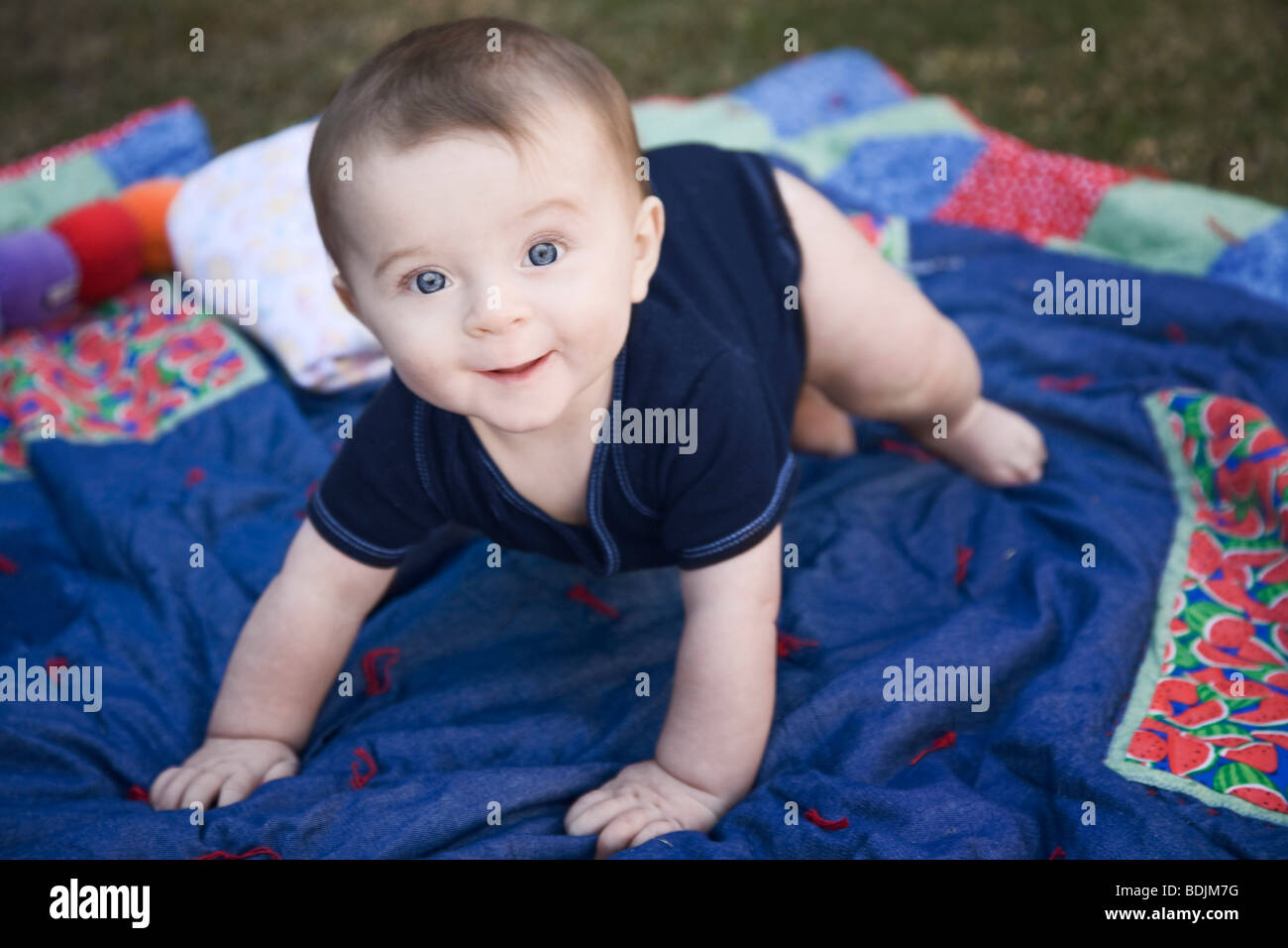 Seated on picnic blanket hi-res stock photography and images - Alamy