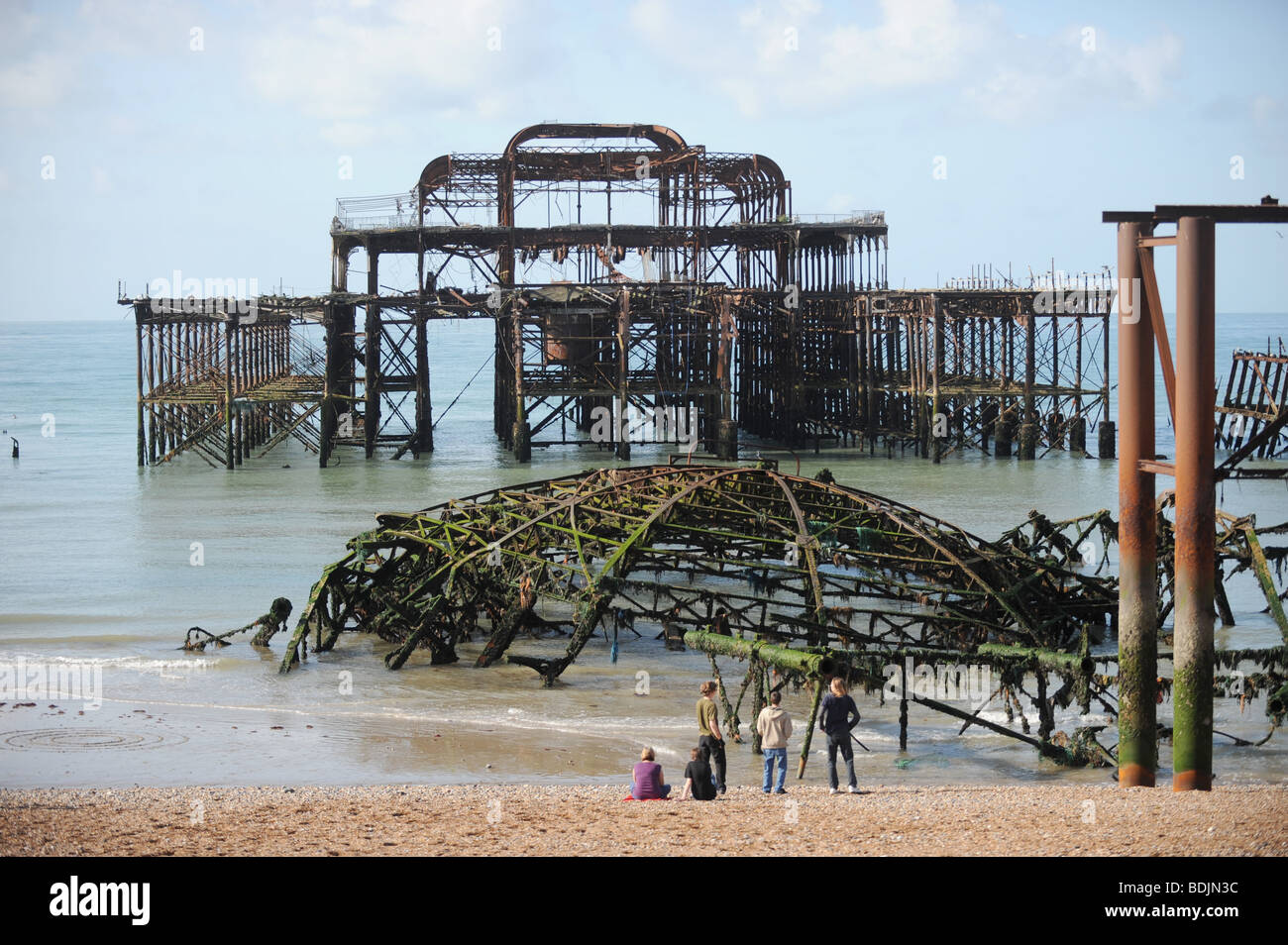 West Pier Brighton at low tide early in the morning Summer UK Stock Photo