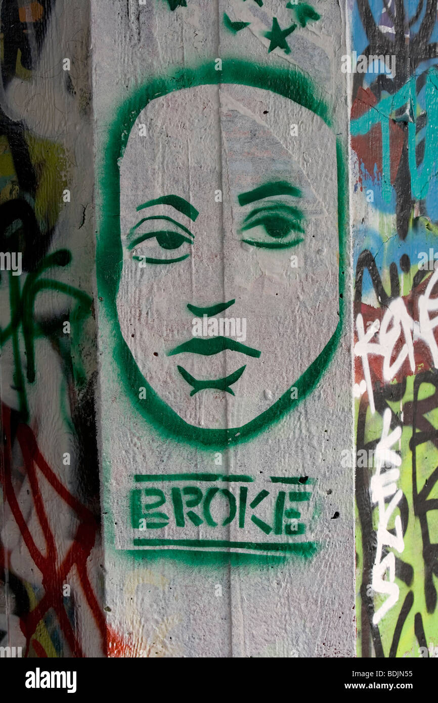 Stenciled graffiti at London's South Bank skate park Stock Photo