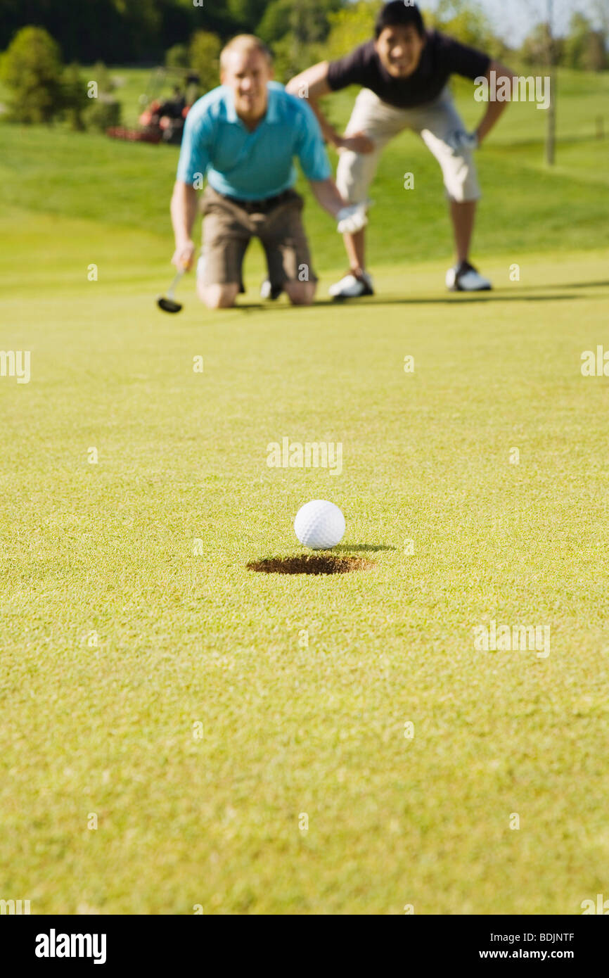 Men Playing Golf Stock Photo