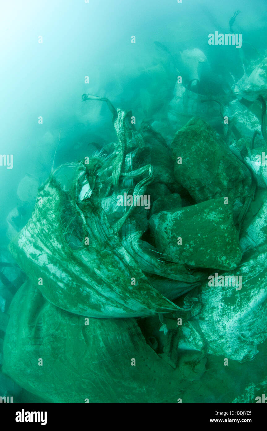 Sacks filled with rocks to fill the gaps in the sea-bed after digging ...