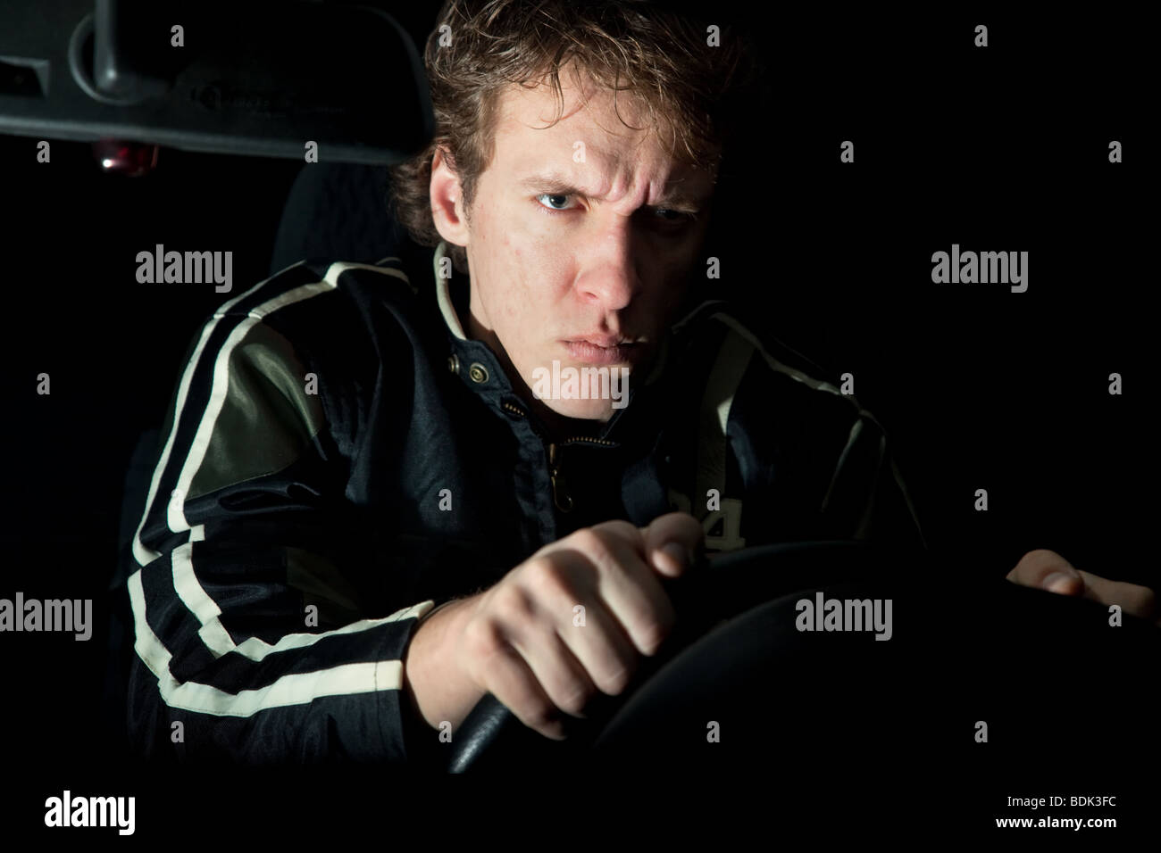 Aggressive and angry driver driving a car Stock Photo