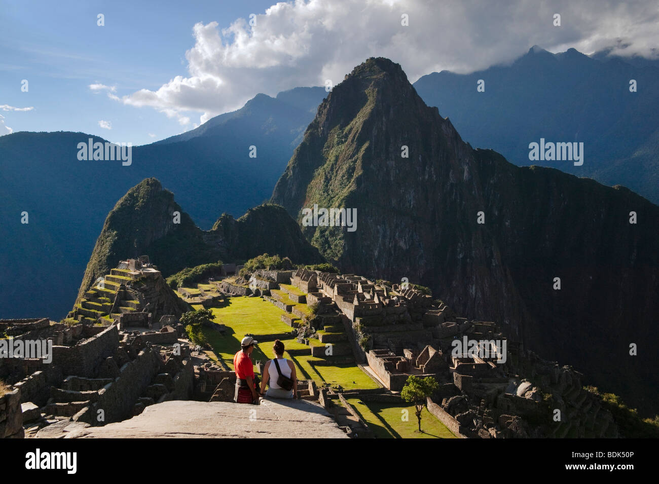 Traveler with ancient ruins of Machu Picchu in the Andes Mountain, Peru ...