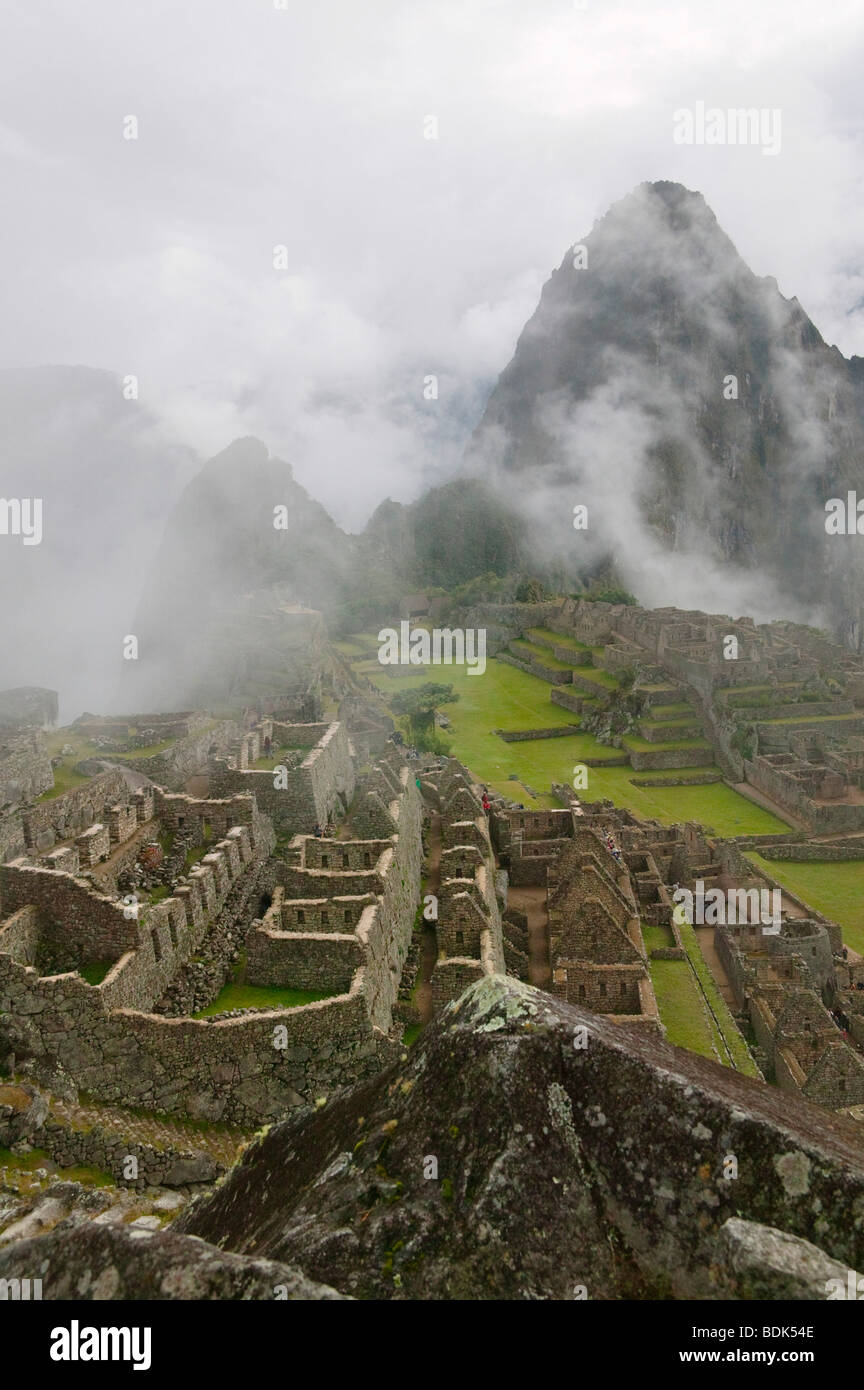 Ancient ruins of Machu Picchu in the Andes Mountain in early morning ...
