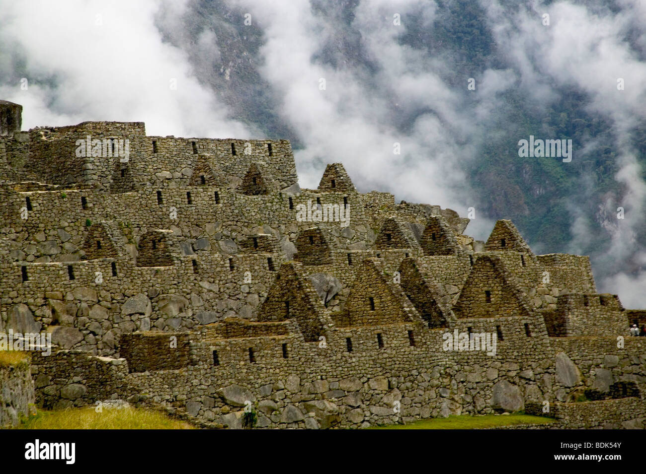 Ancient ruins of Machu Picchu in the Andes Mountain in early morning ...