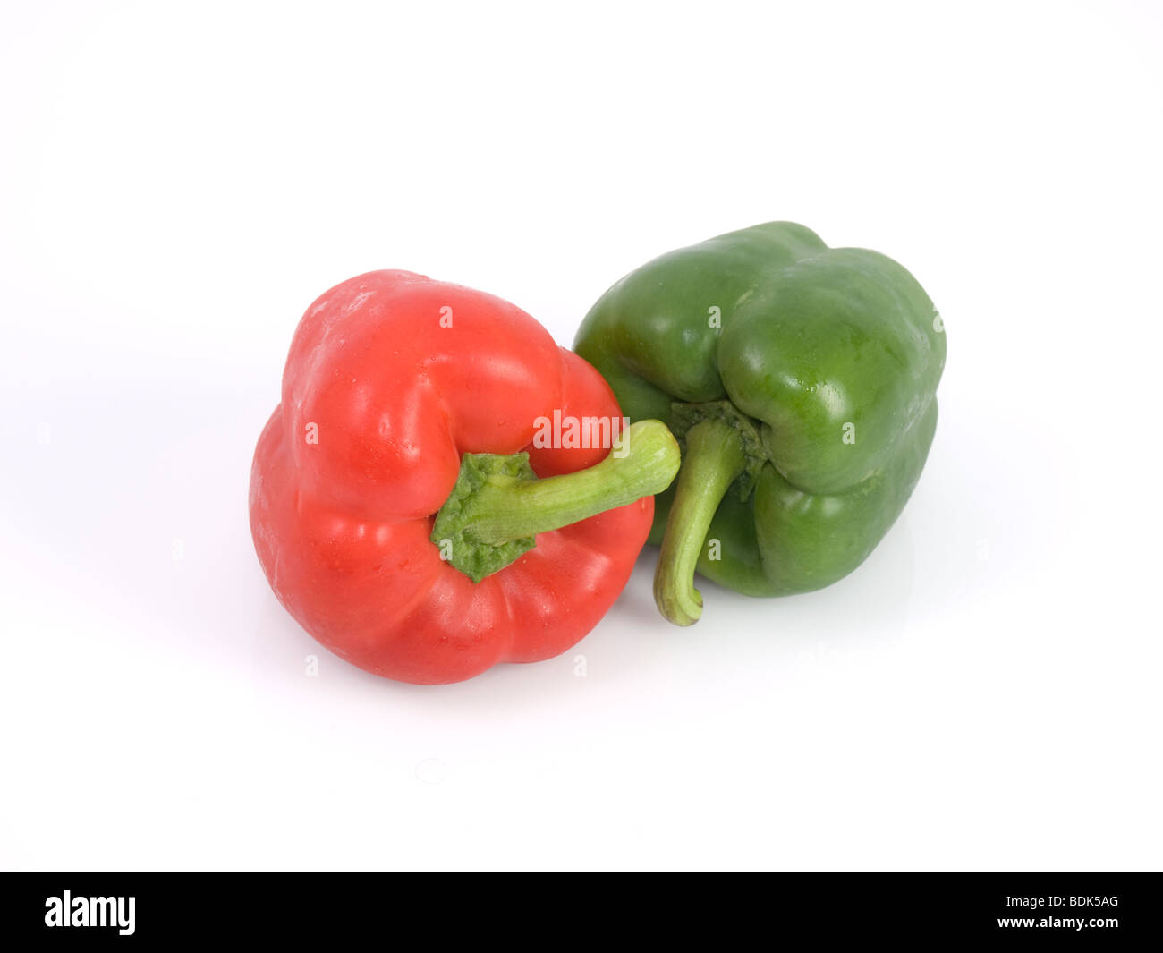 red and green peppers on white background, studio shot Stock Photo - Alamy