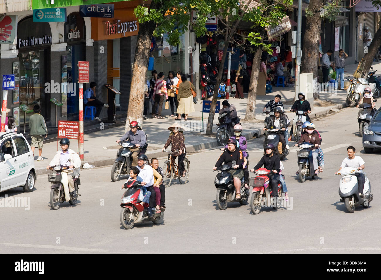 People riding scooters/mopeds in Vietnam in Hanoi Stock Photo Alamy