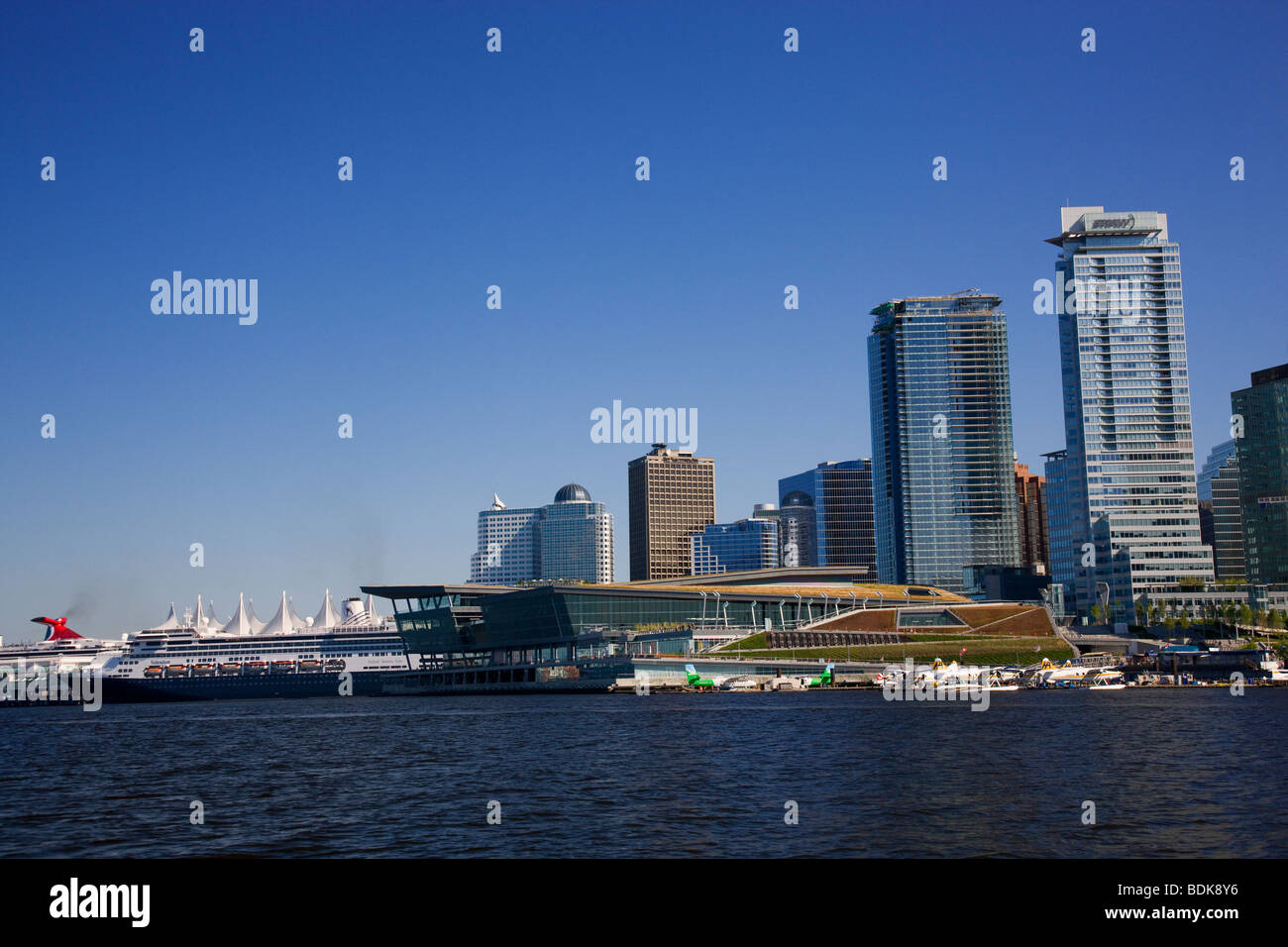Vancouver Convention Centre and downtown Vancouver from Coal Harbour, British Columbia, Canada. Stock Photo