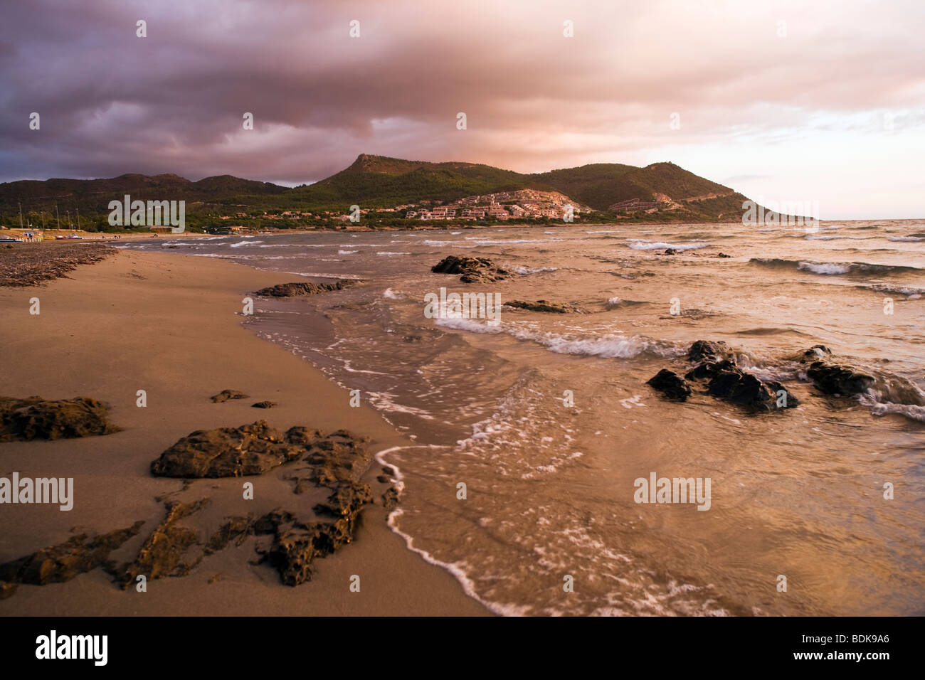 Porto Corallo beach at dawn Stock Photo - Alamy