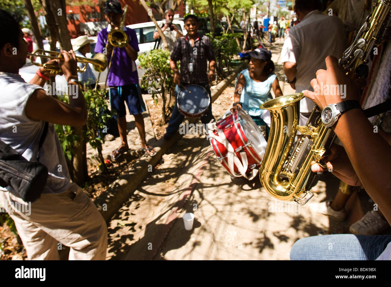 Musicians play on the street during a parade in Tamarindo Costa Rica Stock Photo