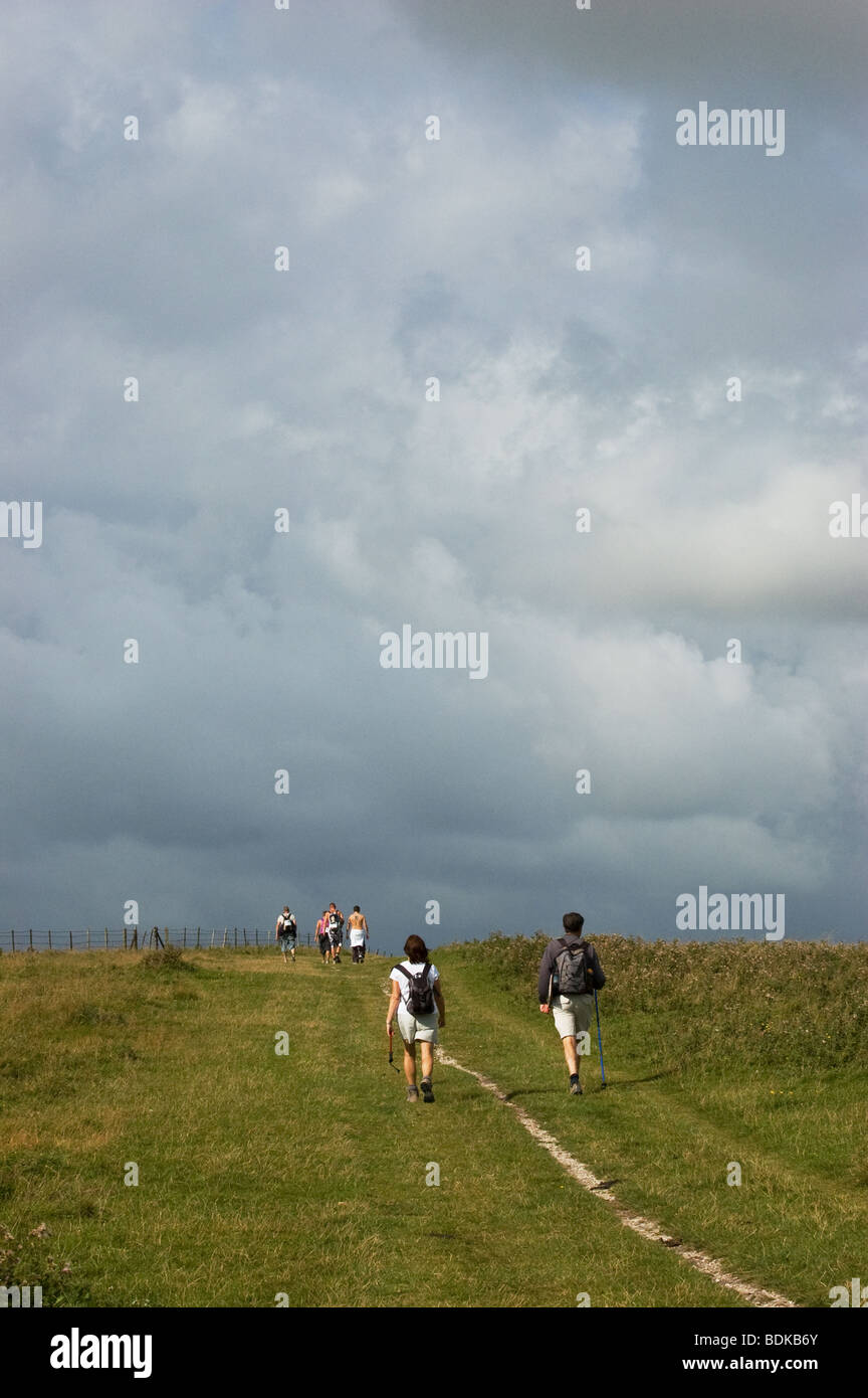 people walking on south downs Stock Photo