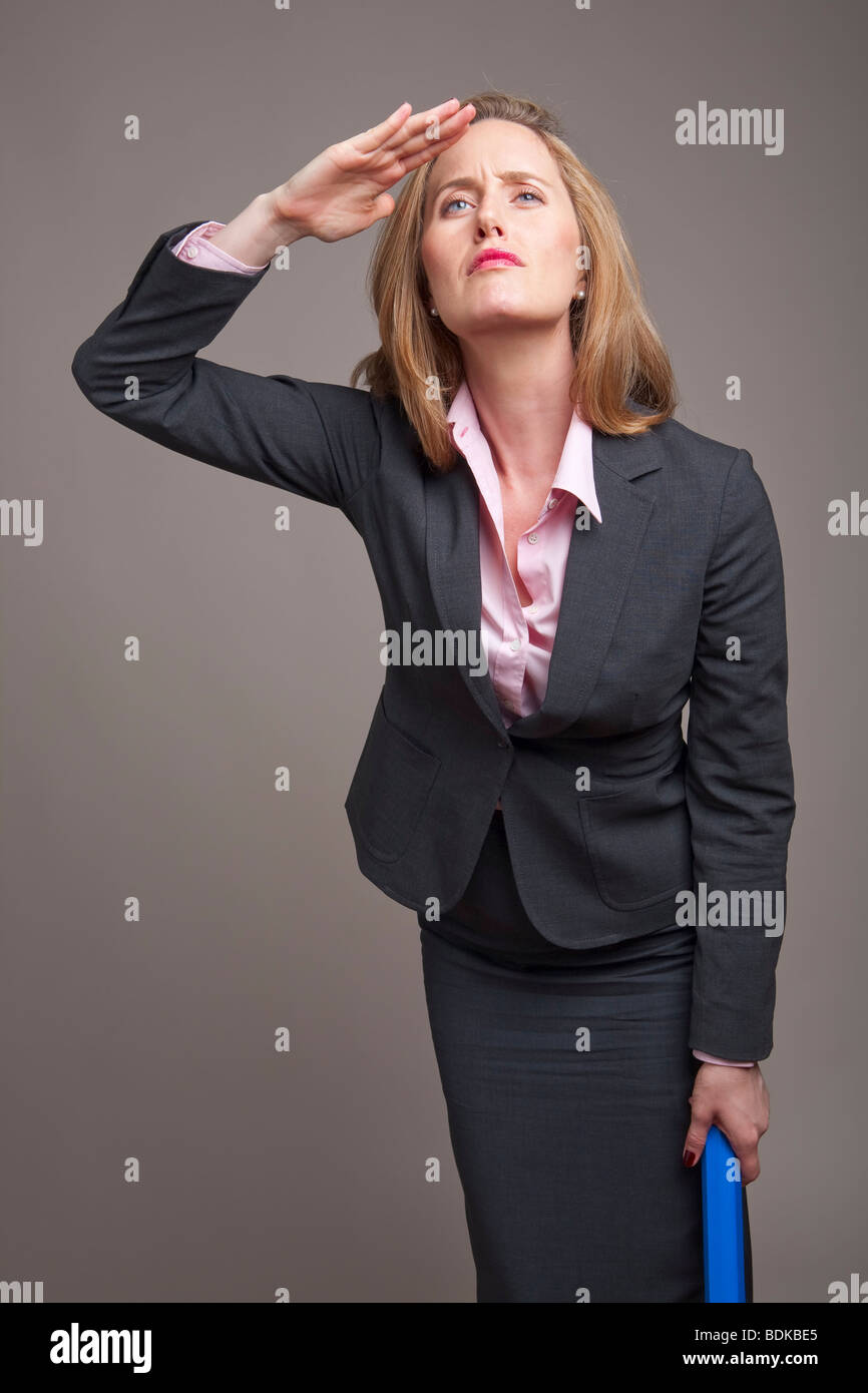 Businesswoman looking out for new business Stock Photo