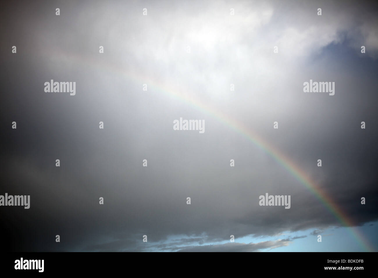 Partial rainbow on a cloudy sky - Aberdeen - Scotland - UK Stock Photo ...