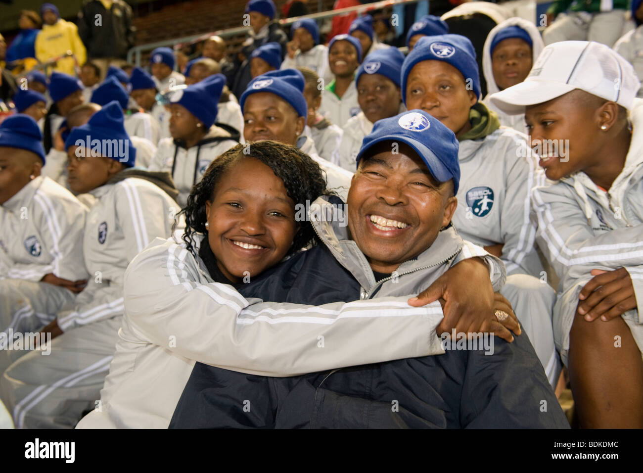 SOCCER FAN HUGGING, NEWLANDS STADIUM, CAPE TOWN SOUTH AFRICA Stock Photo