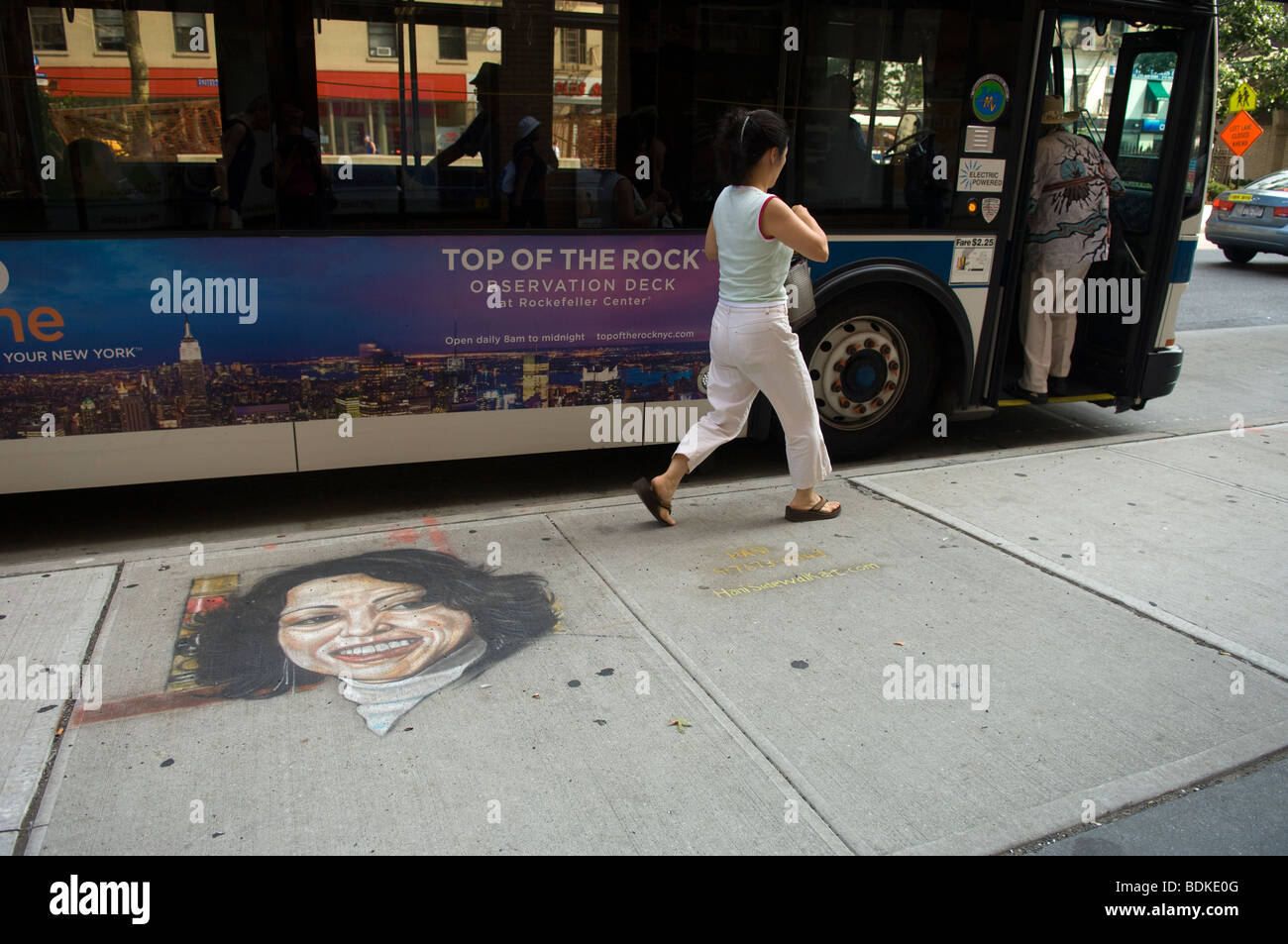 A portrait of Supreme Court Justice Sonia Sotomayor is seen on the sidewalk in New York Stock Photo