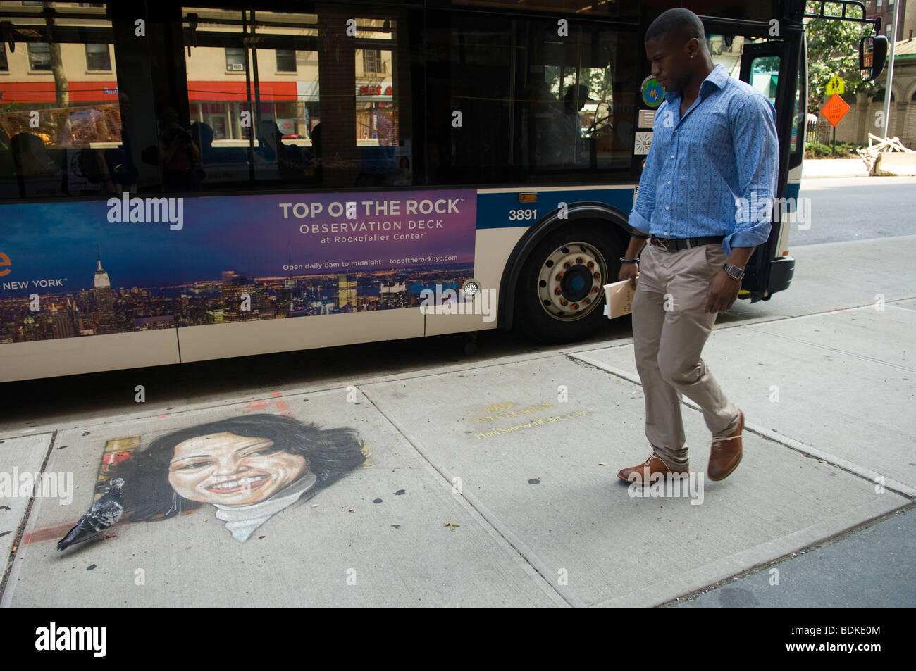 A portrait of Supreme Court Justice Sonia Sotomayor is seen on the sidewalk in New York Stock Photo