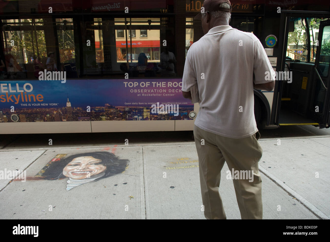 A portrait of Supreme Court Justice Sonia Sotomayor is seen on the sidewalk in New York Stock Photo