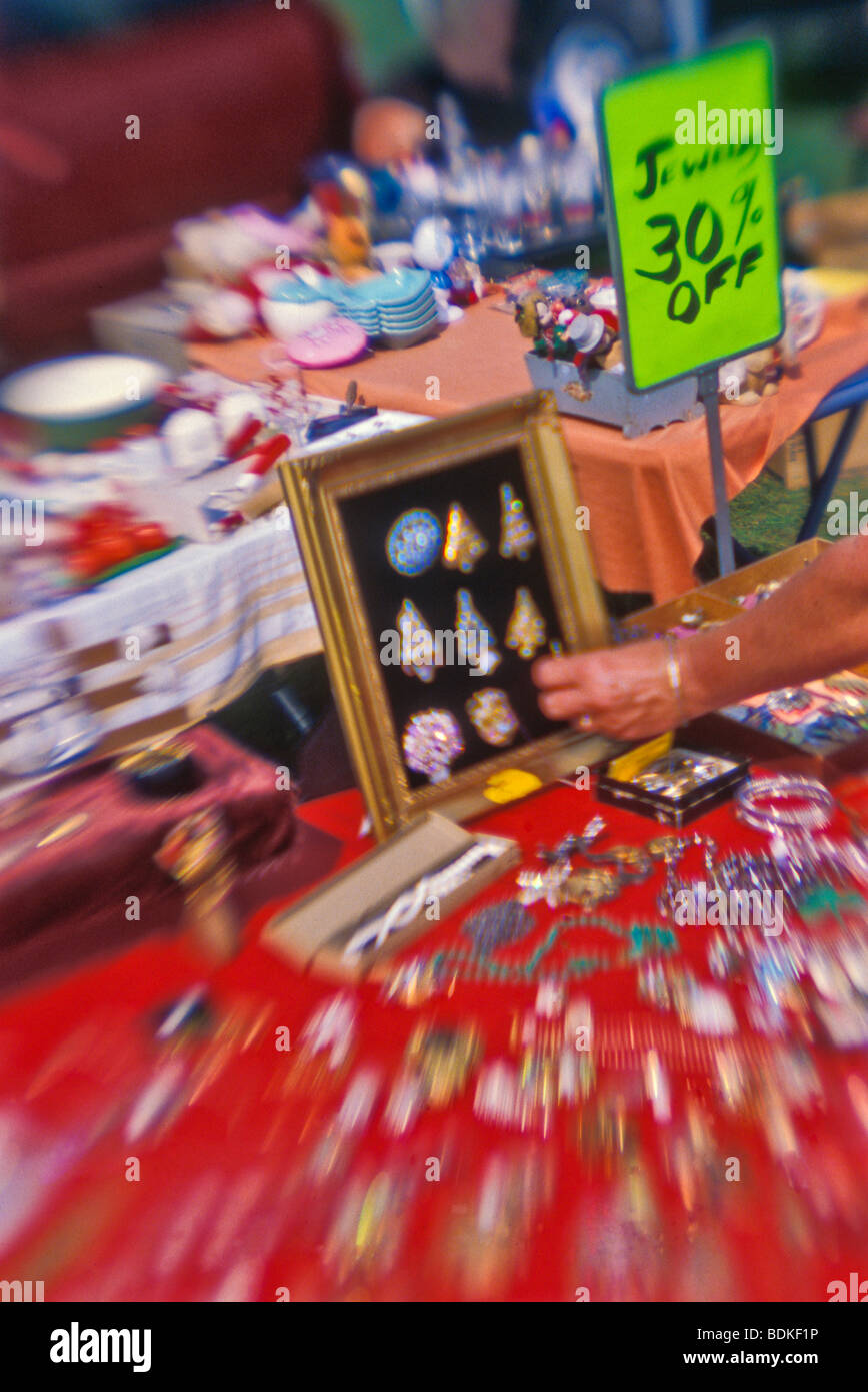 Vendors table of jewelry at yard garage sale Stock Photo Alamy