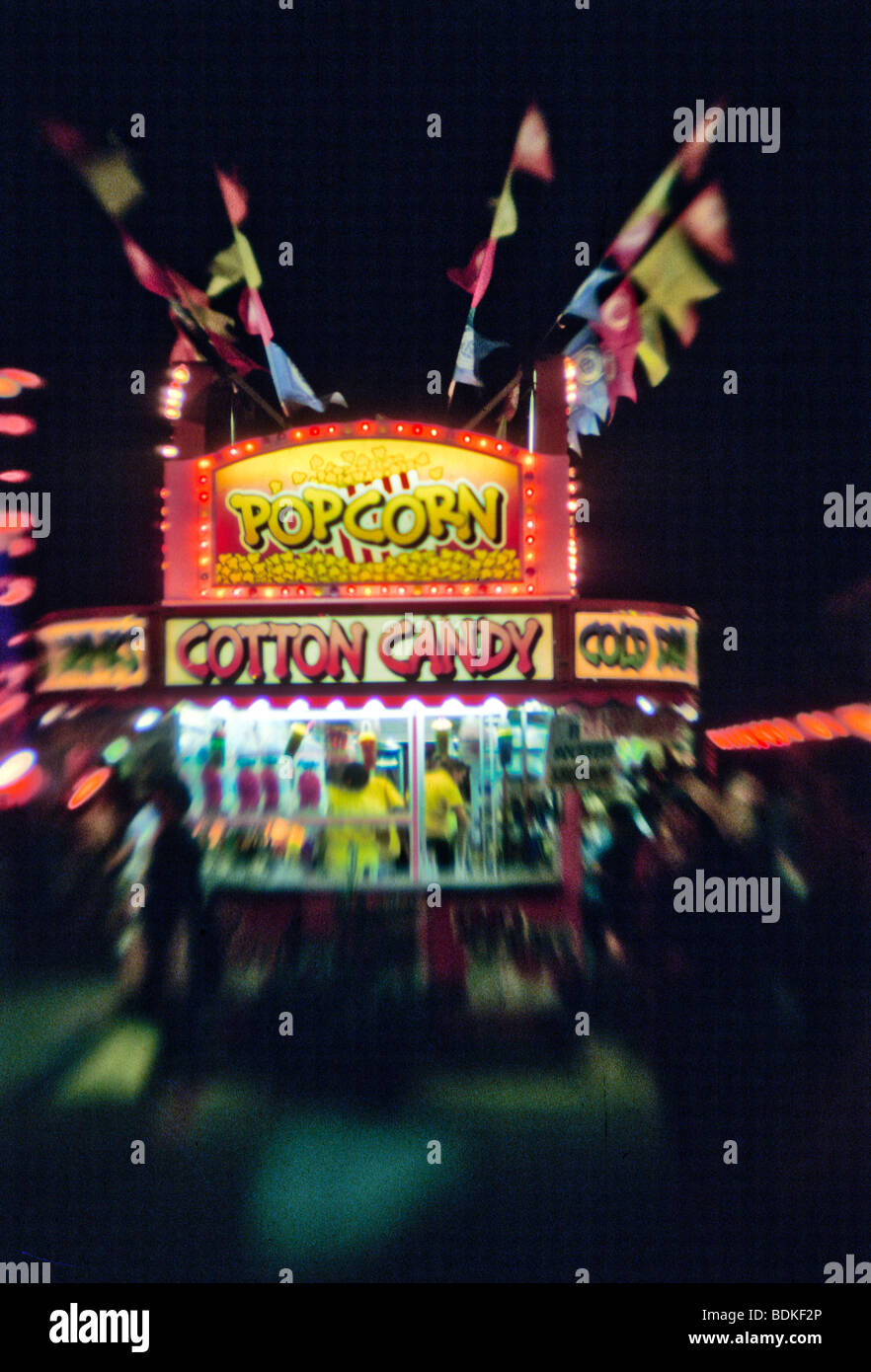 County fair midway fast food stand selling pop corn cotton candy Stock