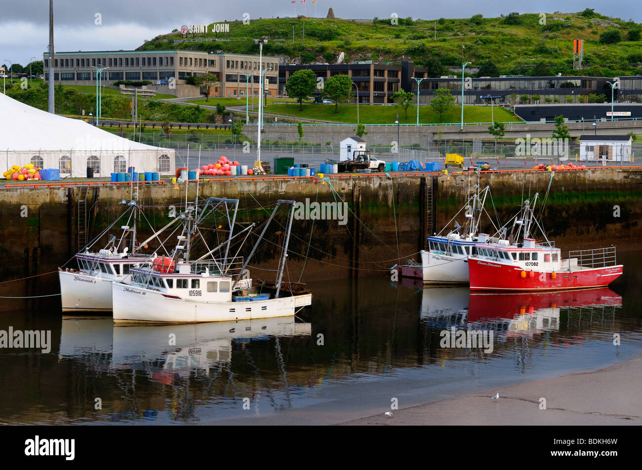 Fishing boats at dawn and low tide in Saint John Harbour New Brunswick