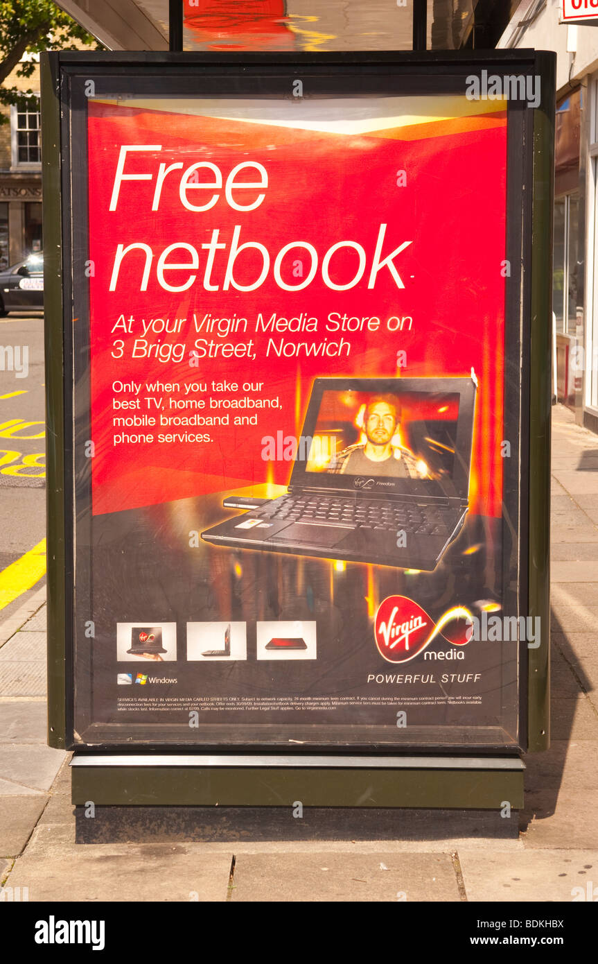 A sign advertising a free netbook computer with Virgin media products in  Norwich Norfolk Uk Stock Photo - Alamy