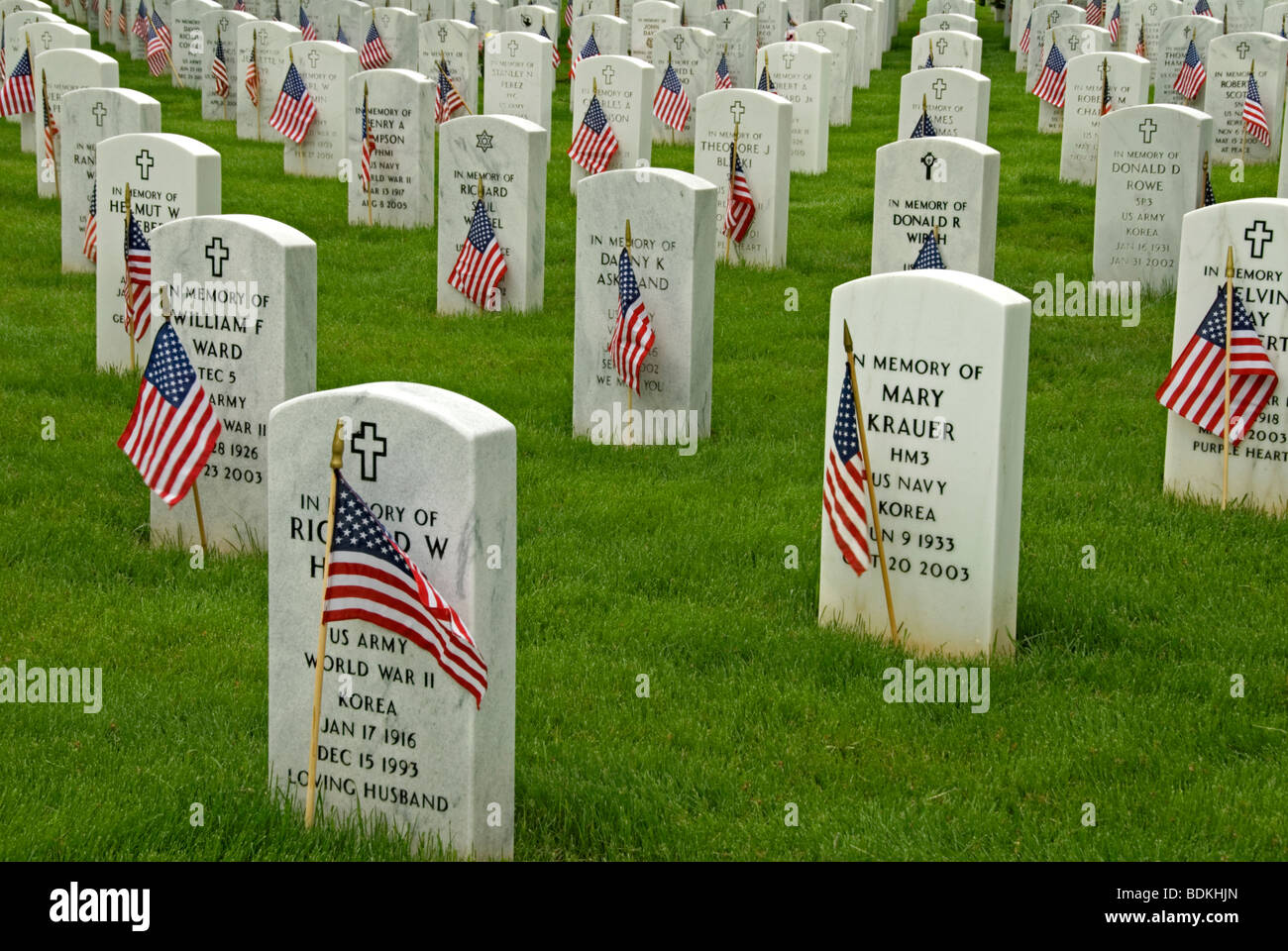 Grouping of headstones and American flags, Fort Logan National Cemetery, Denver Colorado US