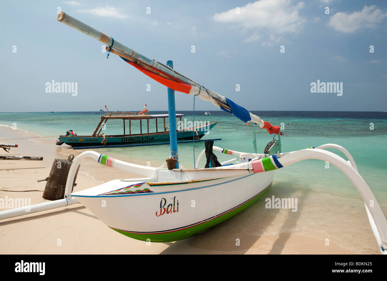 Indonesia, Lombok, Gili Trawangan, beach, outrigger boat opposite Gili Meno island Stock Photo