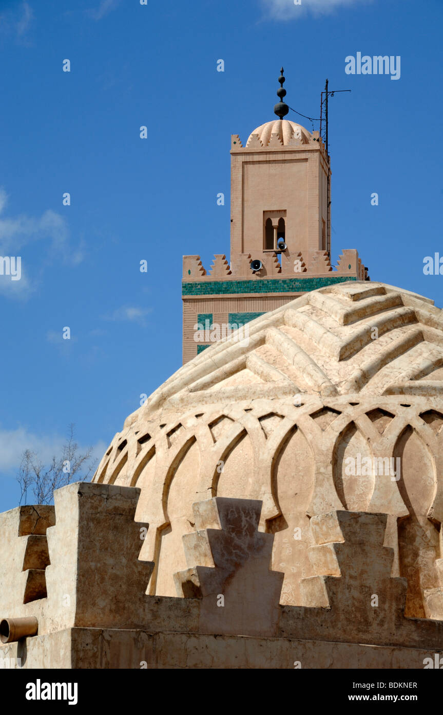 Cupola or Dome of the Koubba Ba'aadiyn Almoravid Ablutions Fountain (c12) & Ali Ben Youssef Minaret & Mosque, Marrakesh, Morocco Stock Photo