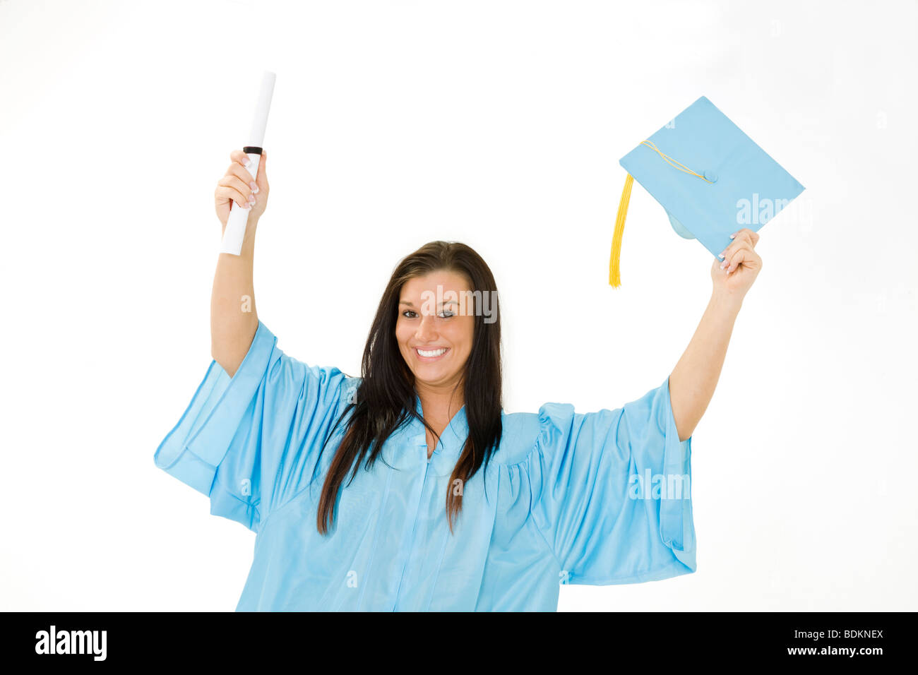 A female caucasian in light blue graduation gown and very excited. She