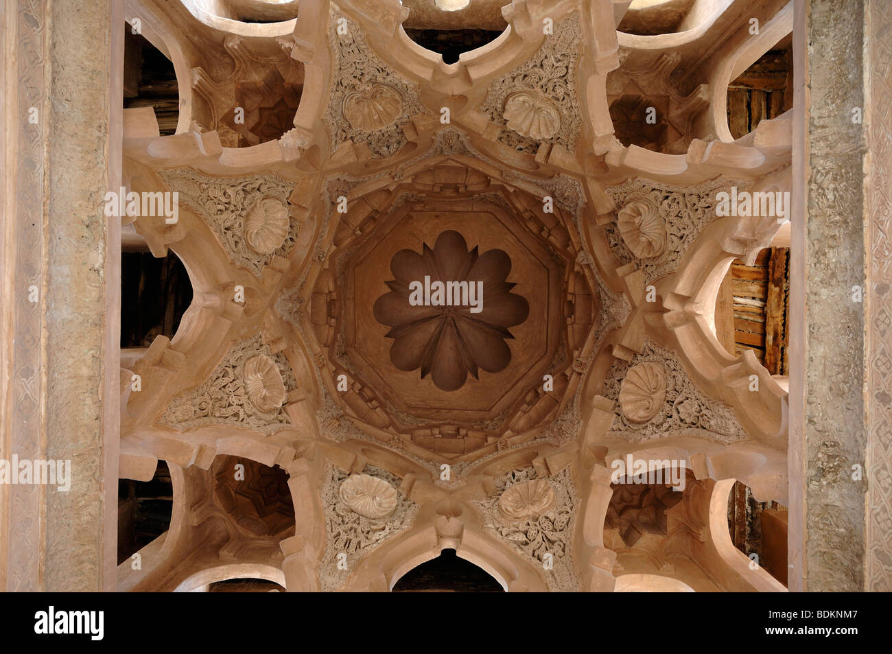 Decorated Dome Ceiling with Carved Arabesques of the Koubba Ba'adiyn Almoravid (c12th), Ablutions Fountain, Marrakesh, Morocco Stock Photo