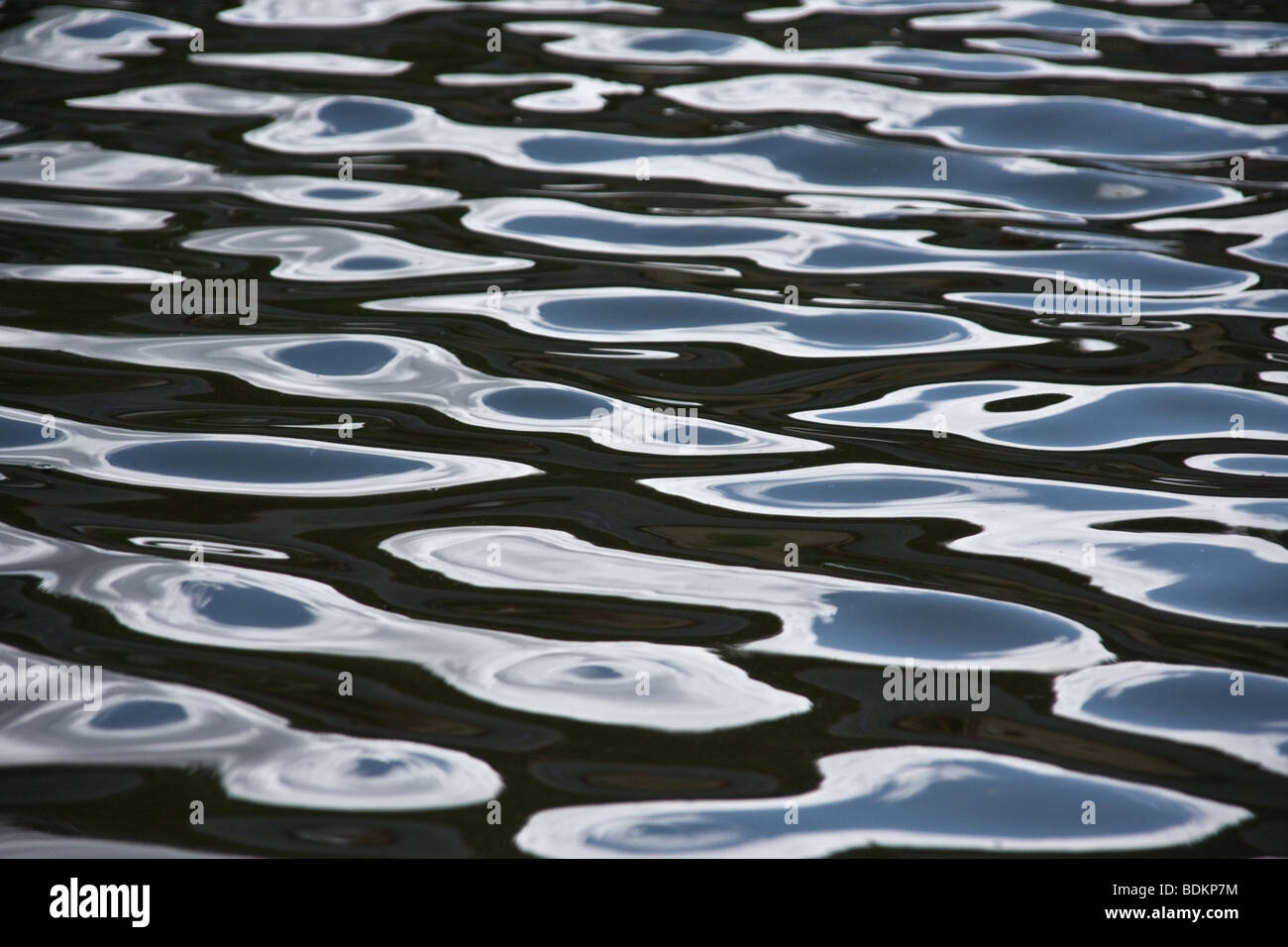 An abstract shot of reflections in the canal, along the cherwell valley walk. Stock Photo