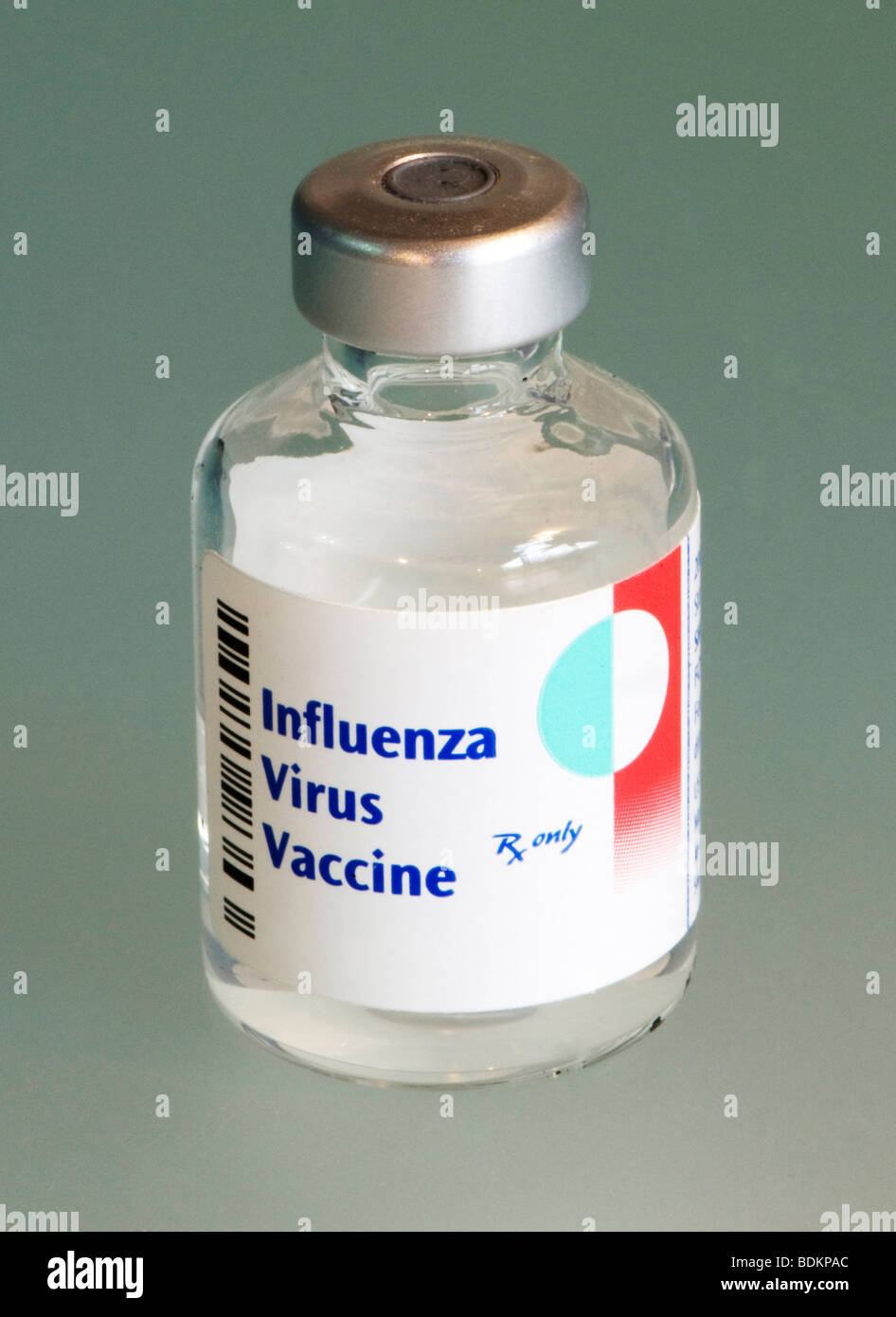 Vial of influenza virus vaccine used to treat the seasonal flu in the 2009-2010 season Stock Photo