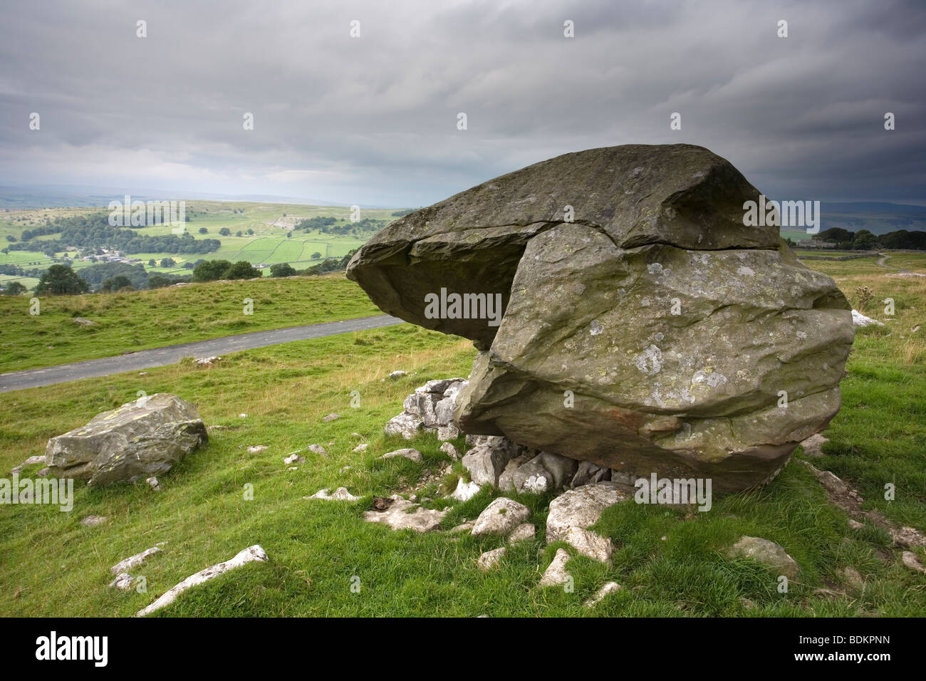 Erratic Boulder overlooking the Winskill Stones nature reserve in the Yorkshire Dales, United Kingdom Stock Photo