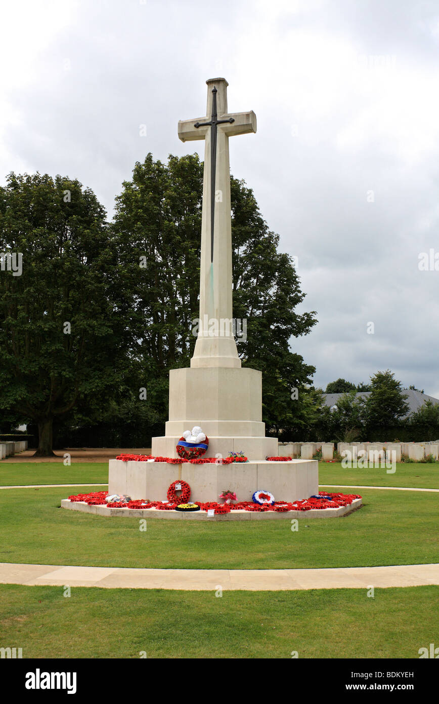 The Cross of Sacrifice or War Cross, designed by Sir Reginald Blomfield, at the British War Cemetery, Bayeux Normandy France. Stock Photo