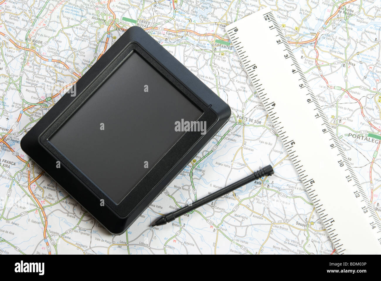 GPS global positioning system device arranged with map Stock Photo Alamy