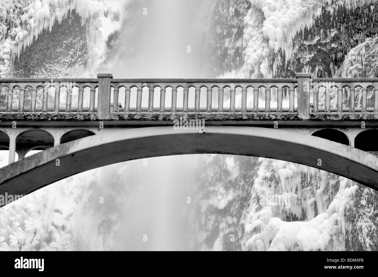 Bridge over Multnomah Falls Oregon with snow and ice after winter storm Stock Photo